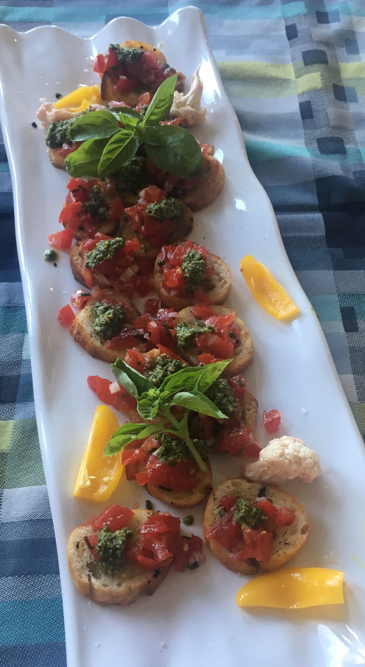 Bruschetta With Vine Ripened Tomato Concassé, Garlic Confit & Pesto