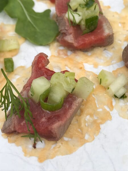 Seared Beef Fillet Mignon with Cucumber/Celery/Scallion Mélange and Dill on Parmesan Crisp Rounds