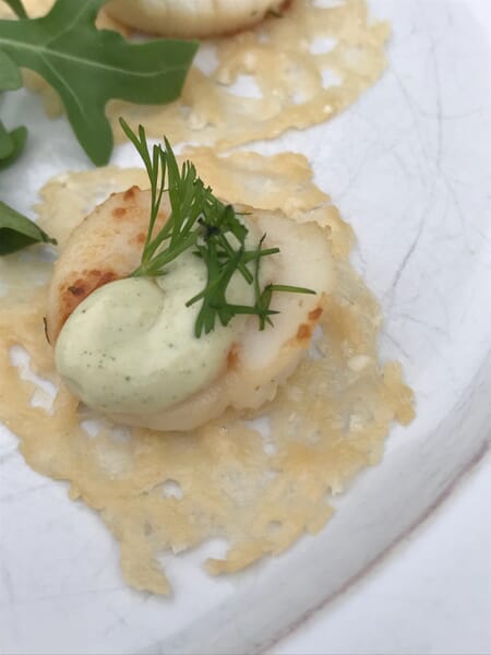 Seared Sea Scallop with Wasabi Cream and Dill on Parmesan Crisp Rounds